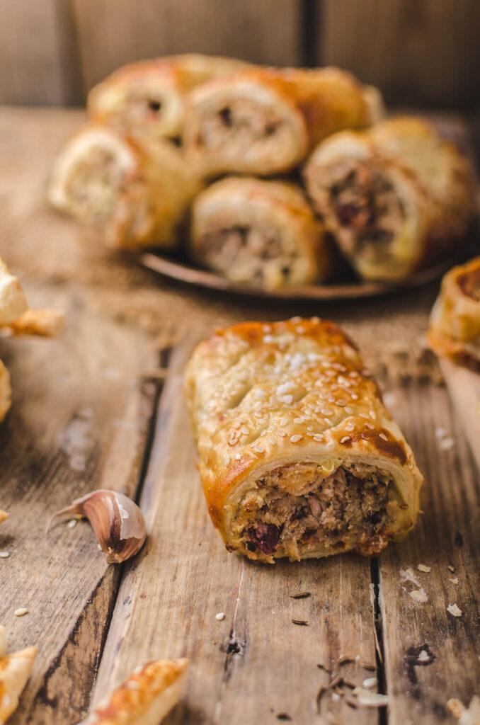 Sausage Rolls on a plate and table